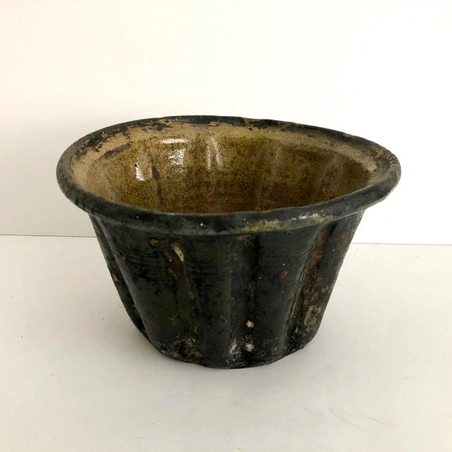 Handmade English terracotta fluted pudding or cake mold with shiny interior and matte black/brown exterior with beautiful...