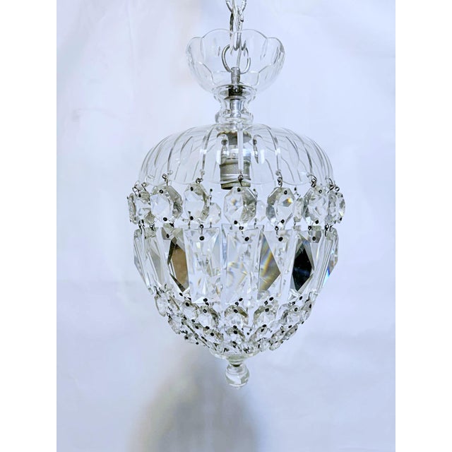 Decorative hand cut basket chandelier with hand cut glass dish frame and 30% leaded A-chain crystals. Rewired and it has...