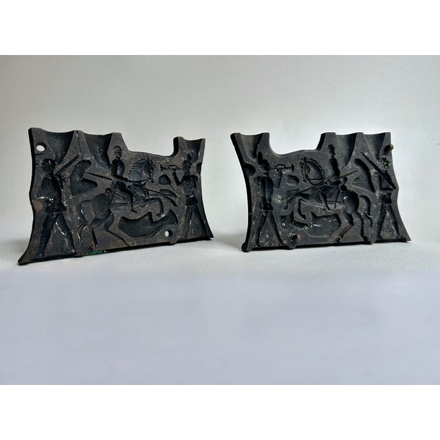 Early 20th Century Make A Toy Co. Three Soldiers & Horse Cast Metal Molds. Featuring a helmeted Soldier on horseback and...