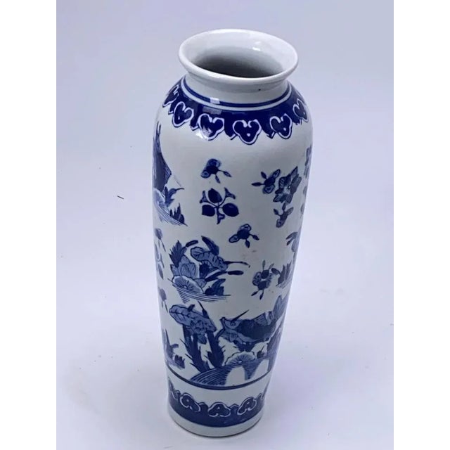 Chinese vase, blue cobalt, and white porcelain. 20th century. Tree decor pattern.