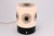 A rare german made table lamp by Erco Leuchten. This lamp has a bakelite base, and a white satined glass lampshade. The...