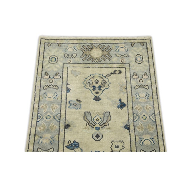 Early 21st Century Cream & Blue Floral Design Handwoven Wool Turkish Oushak Rug 2'4" X 9'10" For Sale - Image 4 of 7