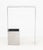Contemporary Stainless Steel Console Table, with trash bin connected to the base. 33" H x 24" W x 10" D. Provenance: From...