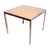 Chic Modernist side, end or small coffee table executed in chrome, wicker and tempered glass, this example is well...