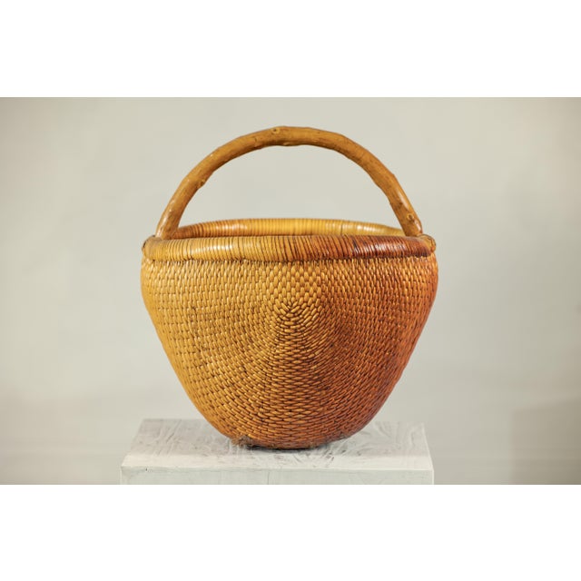 Vintage Chinese Handwoven Rattan Carrying Basket with Arched Handle For Sale - Image 18 of 18