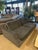 Elegant Sota sofa designed by Massimo Scolari for Giorgetti, crafted in Italy and upholstered in luxurious black and smoke...