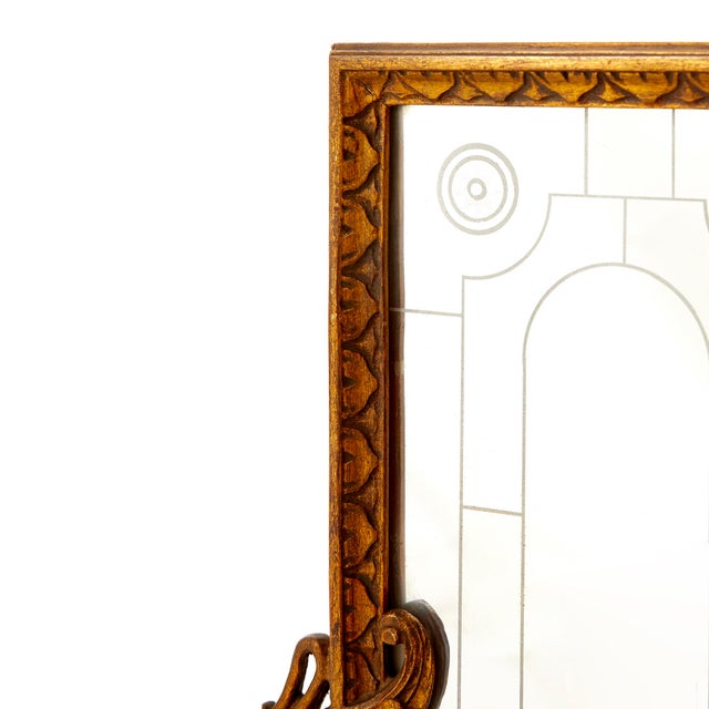 Pair of engraved mirrors, gilded hand carved wood with swans and candleholder. The swans are associated to Josephine, wife...