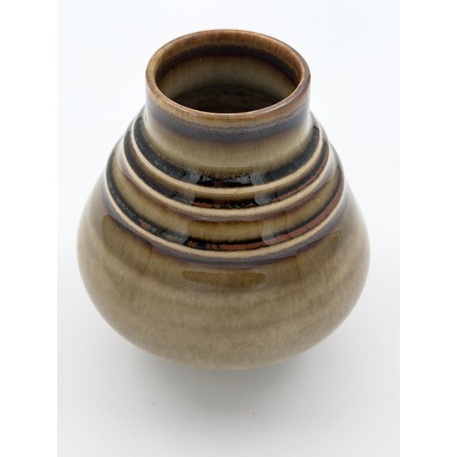 A beautiful Scandinavian stoneware vase from the iconic Bamboo series designed by Olle Alberius for Rörstrand during the...