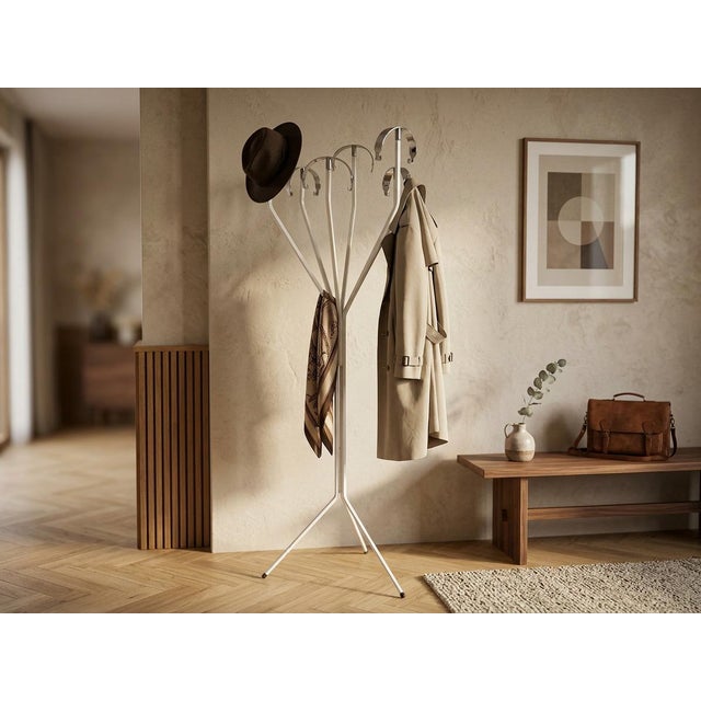 This splendid and rare "Erato" coat stand, a true icon of Italian design, was designed by BBPR and produced by Artemide in...