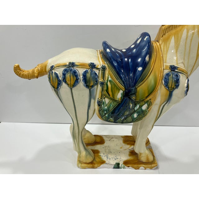 This polychrome Sancai glaze horse is in the Tang style The Tang period ( 618- 907) is considered the golden age in...