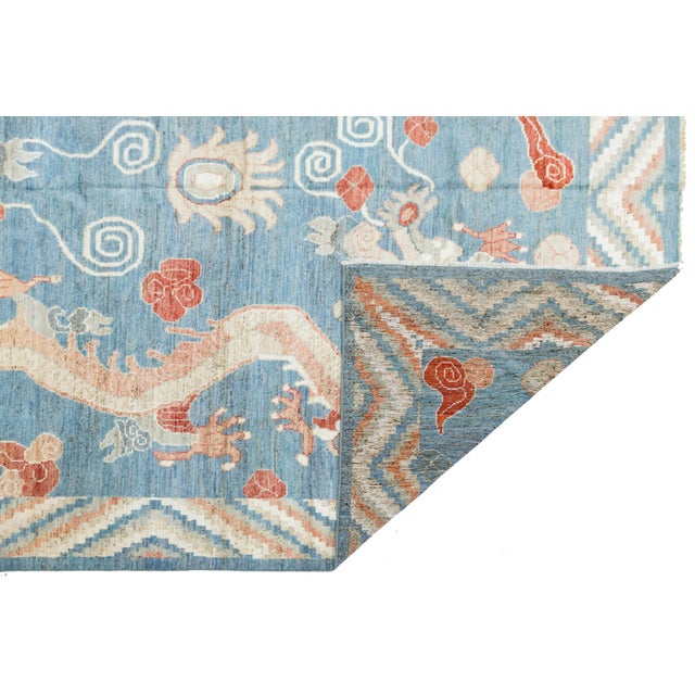 This modern wool rug reinterprets classic Chinese iconography with a fresh aesthetic. It features two Imperial Dragons...