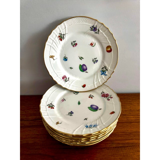 Gorgeous, set of 7 salad/luncheon plates in the Perugia Fruit and Flowers pattern by Richard Ginori, Italy. The design...