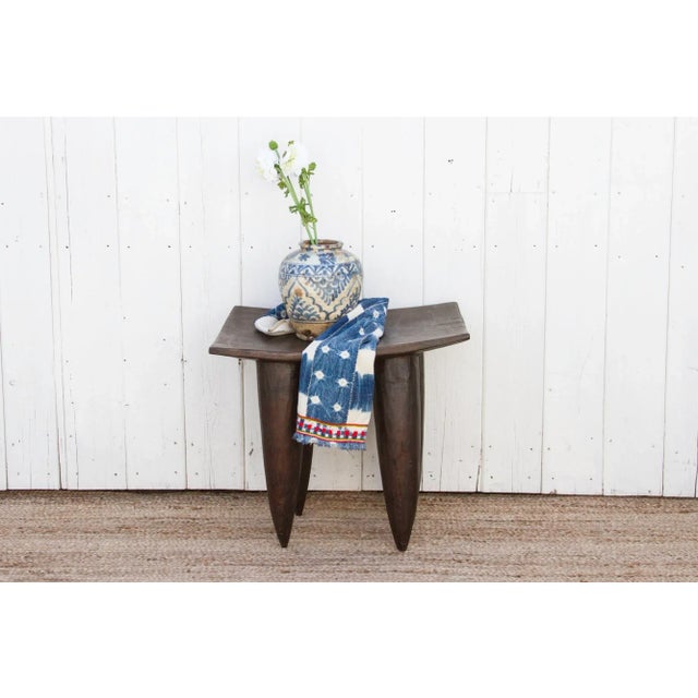 Senufo stools and side tables are traditionally made by the Senufo people, who live in West Africa. This primitive stool...