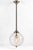 Remains Lighting Sorenson 12 Lantern pendant light, model HL2617.12. The fixture features a clear glass globe with a...