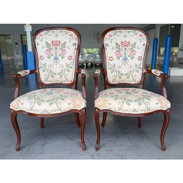 Exceptional set of twelve vintage John Widdicomb dining chairs featuring beautifully shaped wood frames and generously...