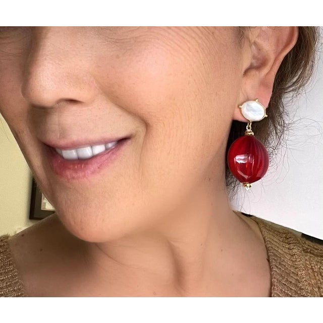 The richest of reds in these Murano blown glass drops paired with Mother of Pearl Doublets. Dramatic yet lightweight