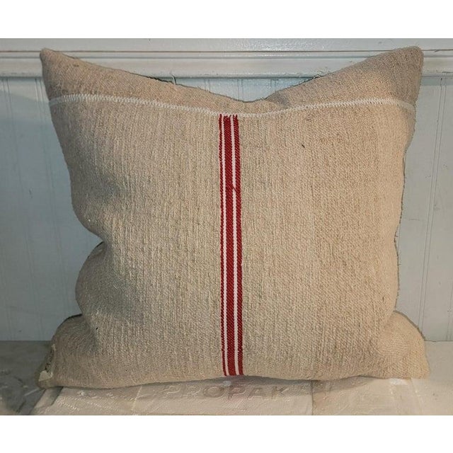This early lithograph pillow is from the early 20thc and has a backing of homespun linen.The condition is very good and...