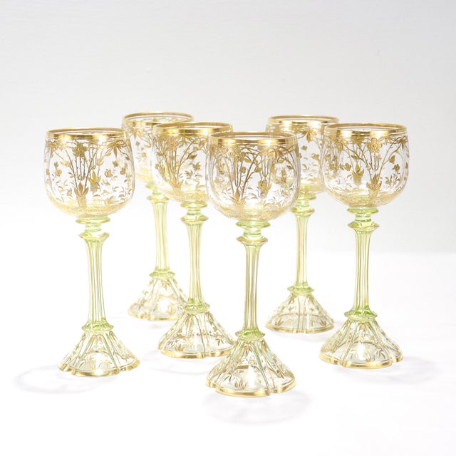 A fine set of 6 antique Art Nouveau white wine stems. In the Moser style. Likely German or Bohemian. Each with a round,...