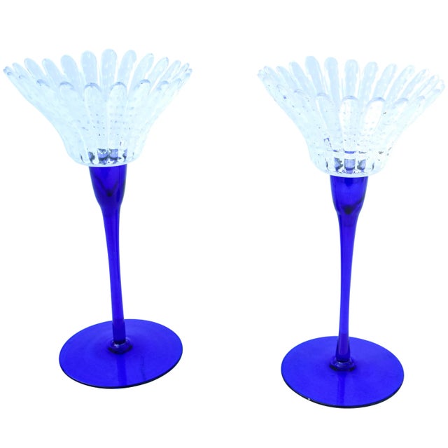 Elegant set of two midcentury heavy handblown blue and clear crystal candleholders with ornate textured dotted pattern,...