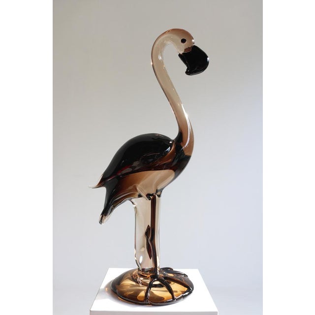 A striking mid-century Murano glass flamingo sculpture signed by Franco Bottaro, Venice ca. 1970s This elegant piece was...
