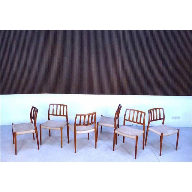 This set of six teak dining chairs were designed by Niels O. Møller for J.L. Moller in Denmark during the 1960s. These...