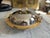 This striking Italian serving dish dates from the 1970s and combines polished stainless steel with gold-tone metal and...