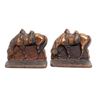 Pair of Cast Iron Riderless Iron Horse Bookends Copper Patina Circa 1930 For Sale