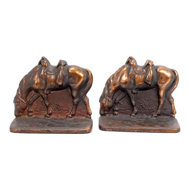 Pair of Cast Iron Riderless Iron Horse Bookends Copper Patina Circa 1930 For Sale