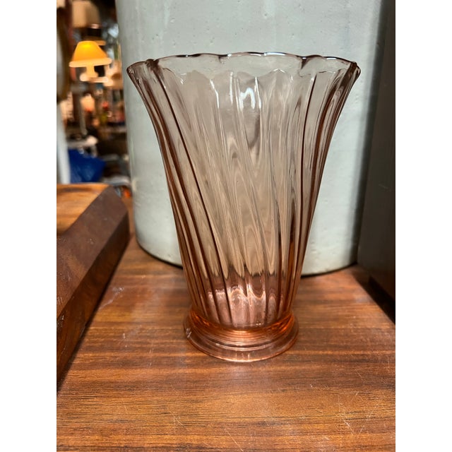 This vase measures 6.5 inches tall . It was made by Jeannette Glass Company between 1937 and 1938. Pink is not too common...