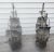 Pair of decorative hand forged iron ships. Good condition. Vintage items form the 1960s. Measures 12"W x 3.5"D x 12"H.