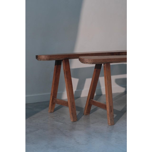 Set of two French farmhouse benches in cherrywood. Cherrywood is prized for its fine grain and warm, reddish-brown glow....