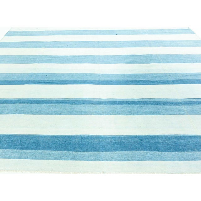 Vintage Indian Dhurrie Striped Rug. Size: 7'9" × 10'8" (236 × 325 cm) Subtle sophistication meets artisanal charm in this...
