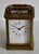 Antique (1920's) Carriage Clock has a Traditional Style. Brass, Handle, and Roman Numeral Face. The Measurements: 3"W x...