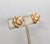 1970s textured goldtone flower with faux-pearl center clip earrings. Marked crown "TRIFARI©" on the clips. Measure: 3/4...