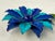 1960s Enamel Over Metal Two Tone Blue Flower Brooch Mod Daisy. Measures 3.25” x 2.25” diameter.