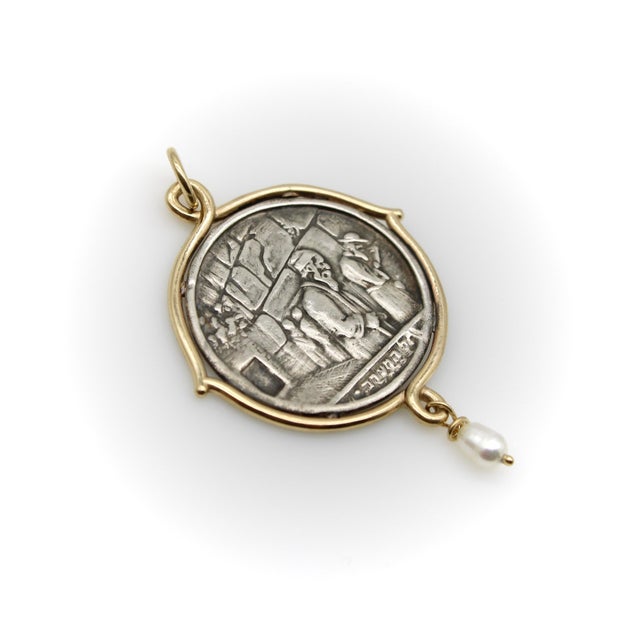 Rendered in 14k gold and sterling silver, this medallion is part of Brother Wolf’s collection of religious-inspired...