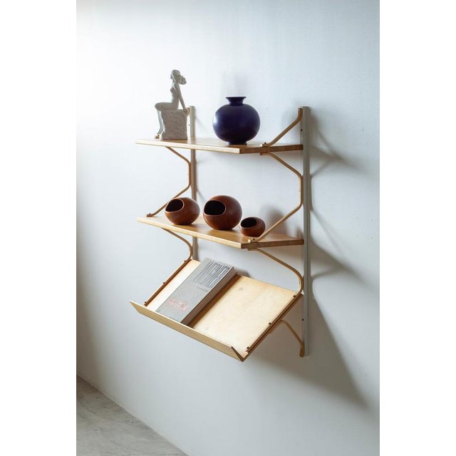 Wall mounted shelf designed by bruno mathsson. Produced in sweden by firma karl mathsson in 1967. Bent wood consoles made...