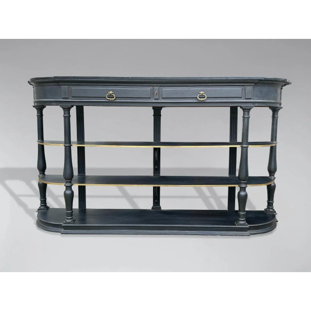 A 19th-century French painted mahogany console table with the original shaped black marble top above a pair of drawers...