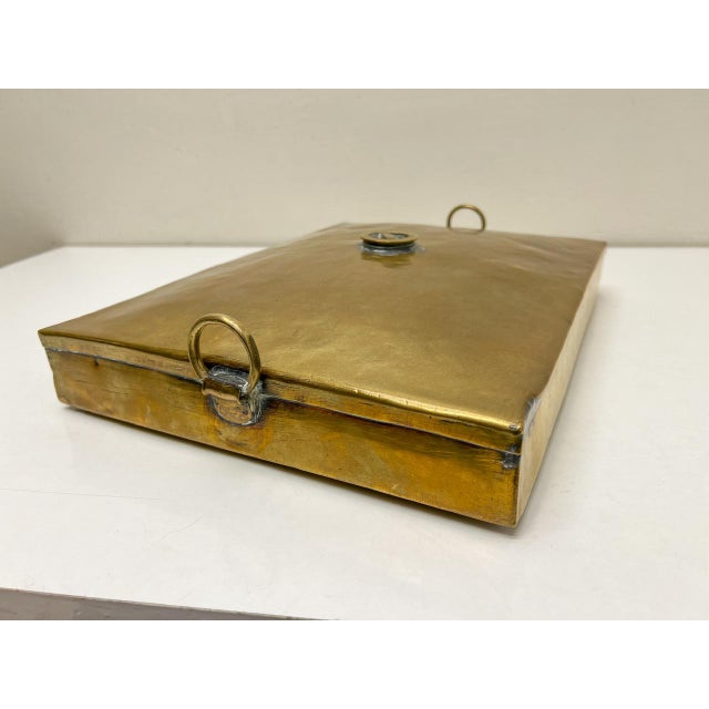 Beautiful antique flat brass foot warmer with removable cap. This was used in a carriage to warm feet and was made in the...