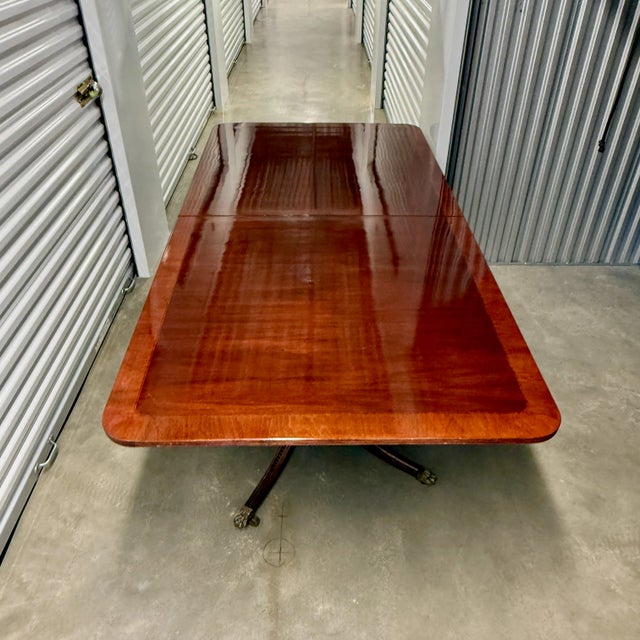 Vintage Double Pedestal Dining Table A beautiful high-gloss mahogany banded table with two leaves. Table can be as small...
