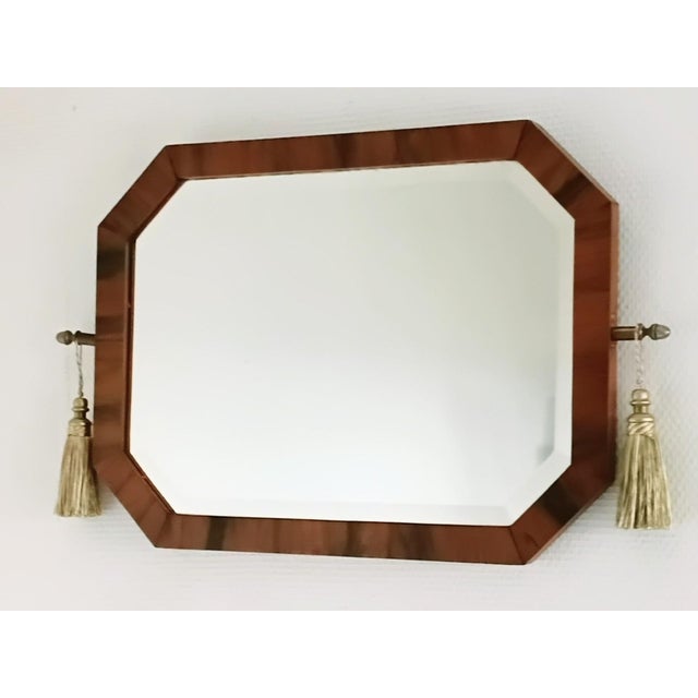Rare and authentic large Art Deco mirror. French work around 1930 made of walnut wood. Very good vintage condition. the...