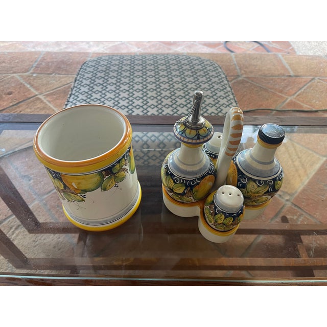 This listing is for an authentic five-piece hand-painted ceramic condiment set crafted by the renowned studio Ceramiche...