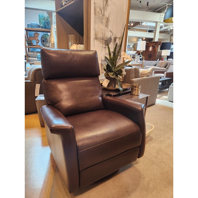 Dimensions: 34'W x 38"D x 44"H / 73"D Fully Open Base: Swivel Disc Finish: Natural Walnut Mechanism: Manual Leather: Haven...
