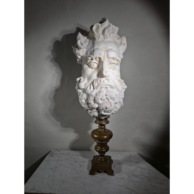 This spectacular plaster sculpture, depicting the majestic face of Zeus, is a true gem from the 19th century. Crafted in...