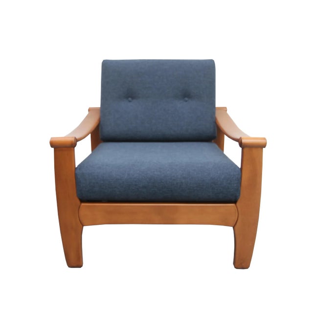 - 1960s armchair - Solid wooden construction - Removable cushions have been reupholstered - Coarse dark blue upholstery...