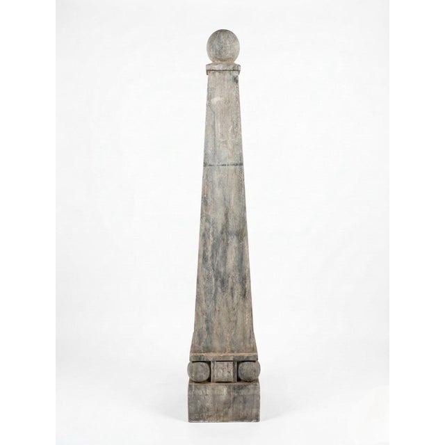 Enhance your space with this striking pair of towering Grand Tour style obelisks. Standing at an impressive 59 inches...