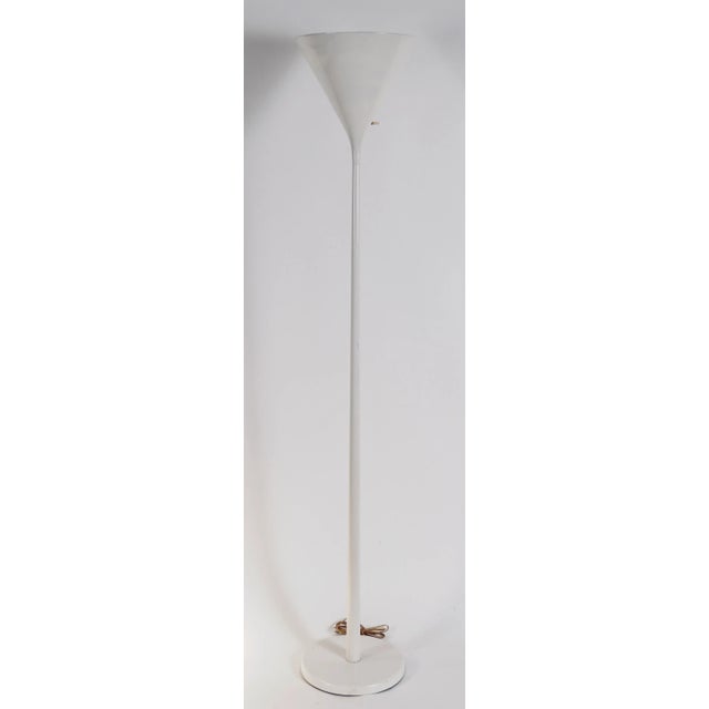 Vintage 'trumpet' torchiere lamp in off-white by Walter von Nessen. Manufacturer stamp under base.The lamp does have a...