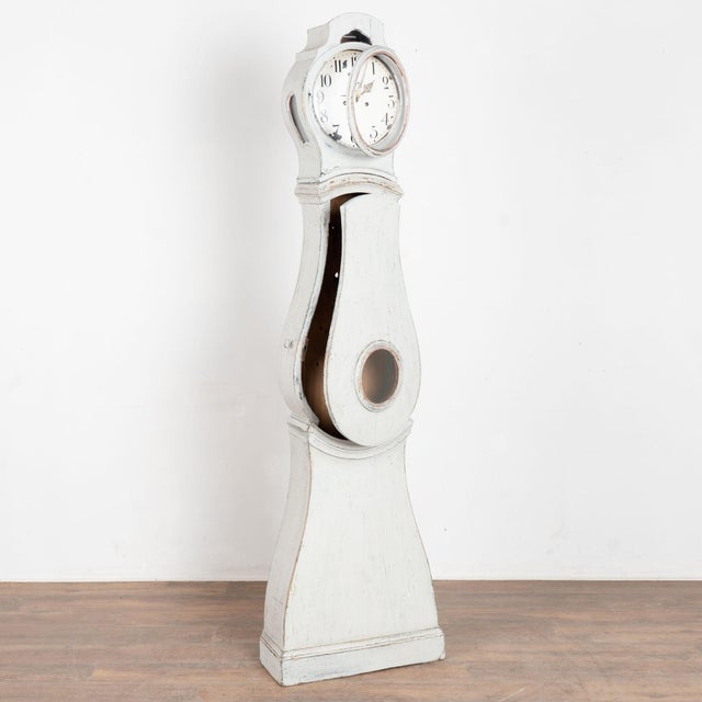 Swedish mora grandfather clocks are identified by their gentle curves and classic style as seen in this exceptional...