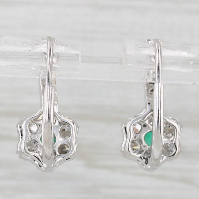 Gemstone Information: - Natural Emeralds - Total Carats - 0.24ctw Cut - Round Color - Green Treatment - Oiling - Natural...