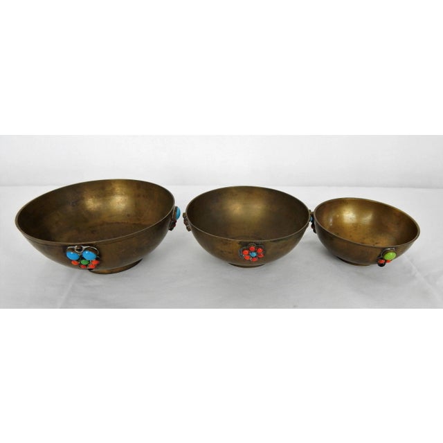 Set of 3 vintage hand-crafted stackable brass bowls featuring applied semi-precious stones. Bases are marked "India", see...